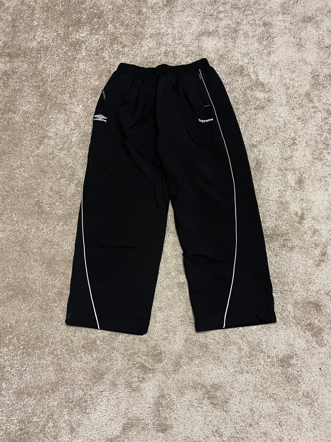 Black Supreme track trousers