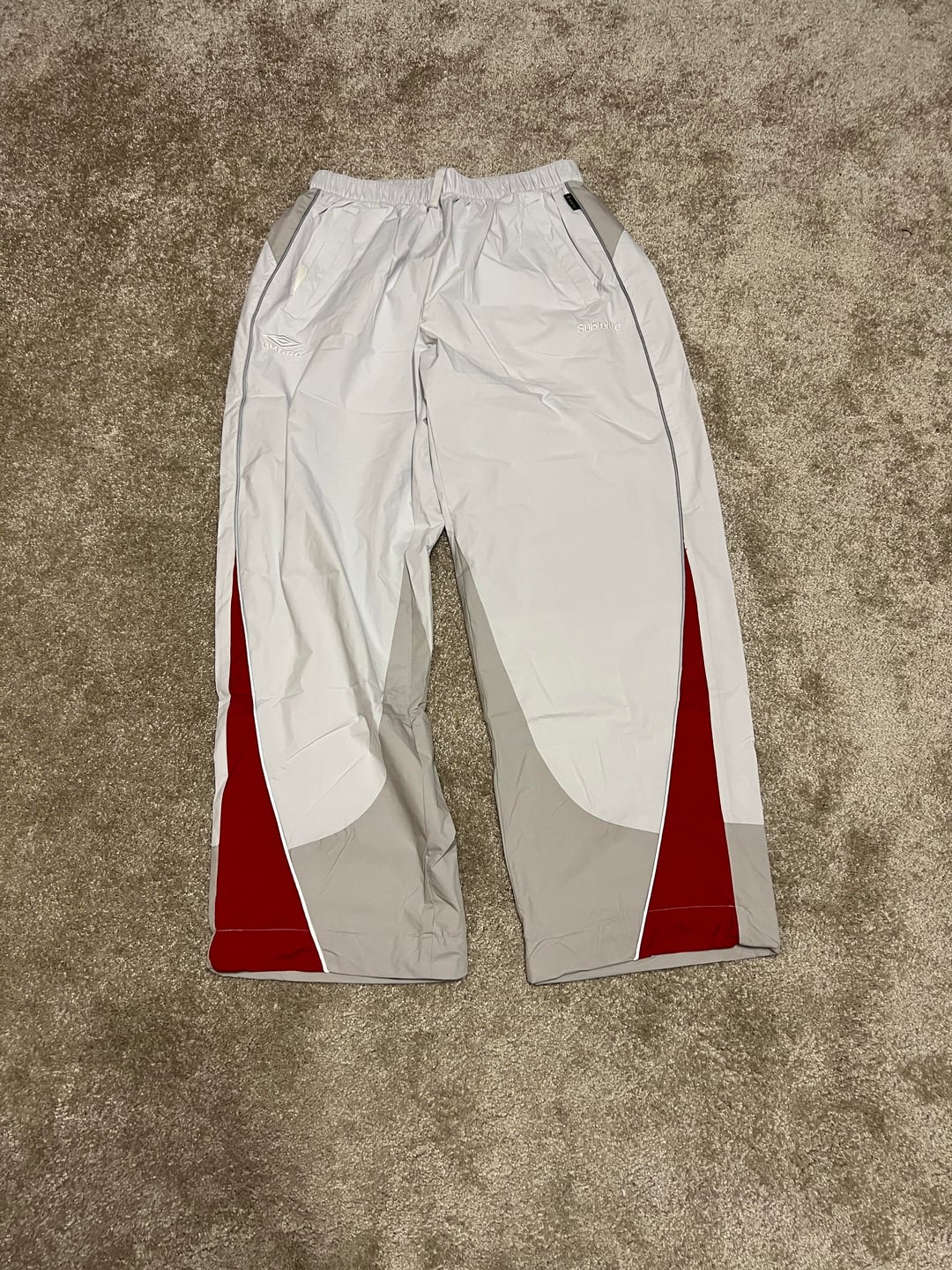 Grey Supreme and Umbro track trousers