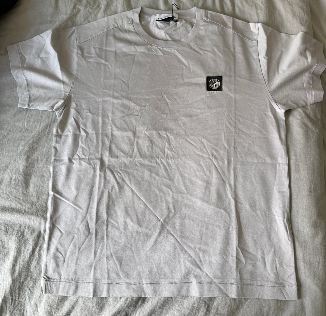 Grey short-sleeve T-shirt laid flat