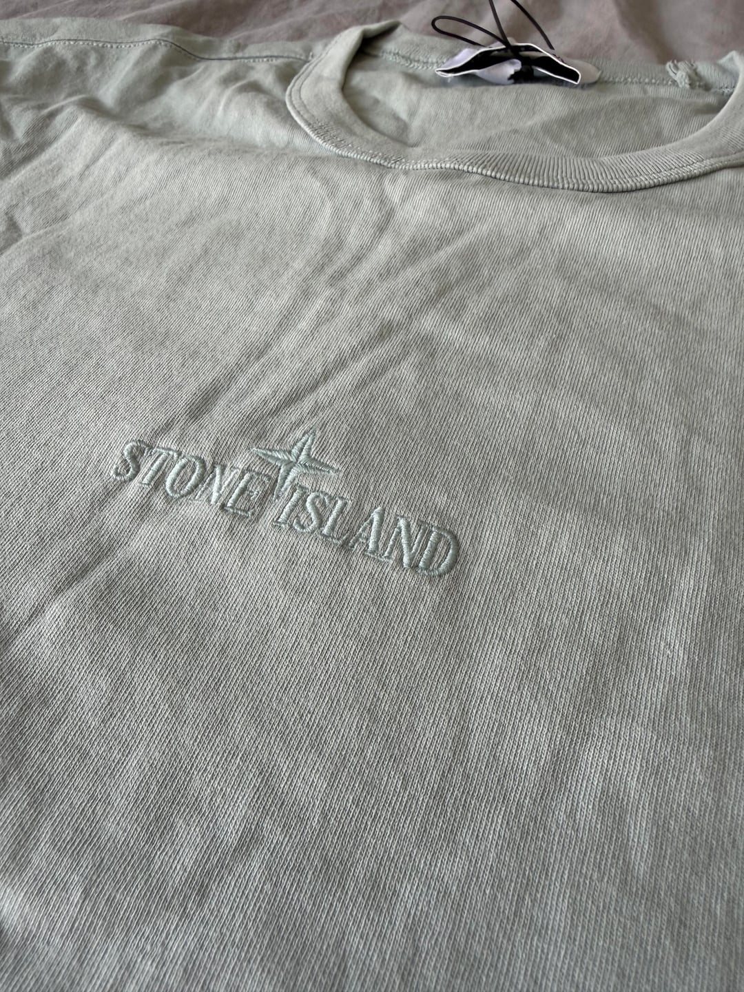 Embroidered T-shirt lettering close-up