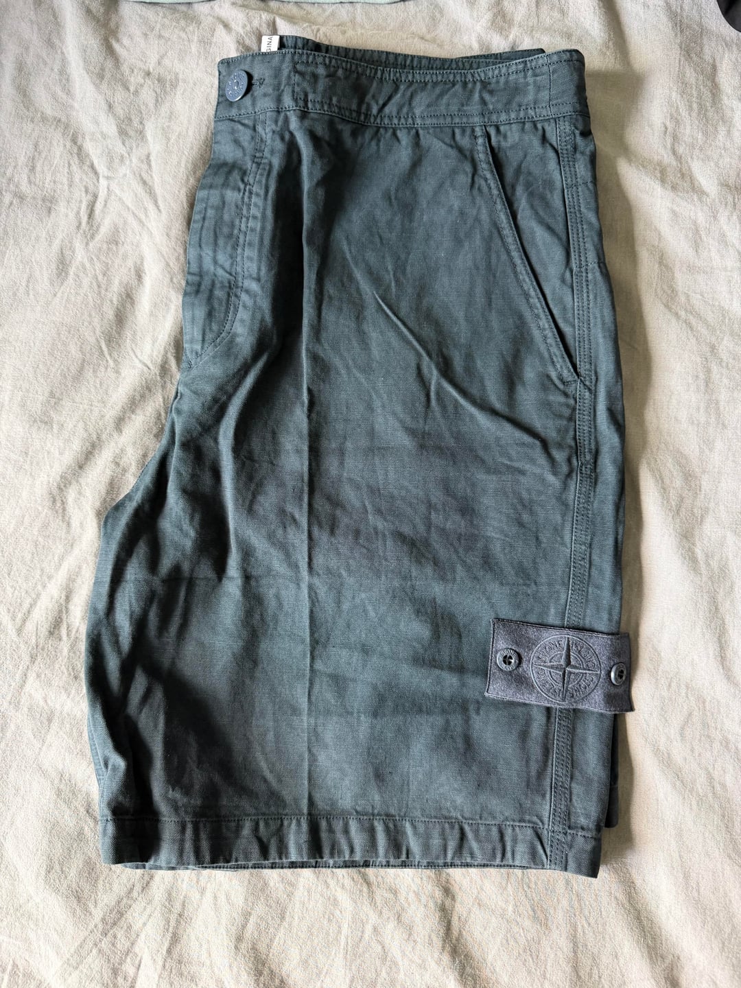 Slate-blue shorts, side pocket