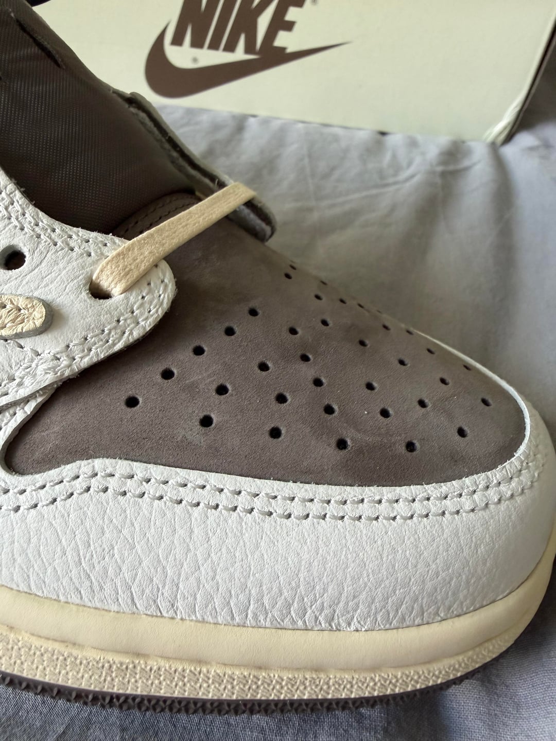 Trainer toe, laces and box close-up