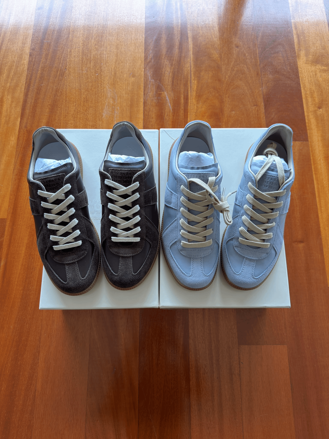 Brown and pale-blue trainers, laces and toe view