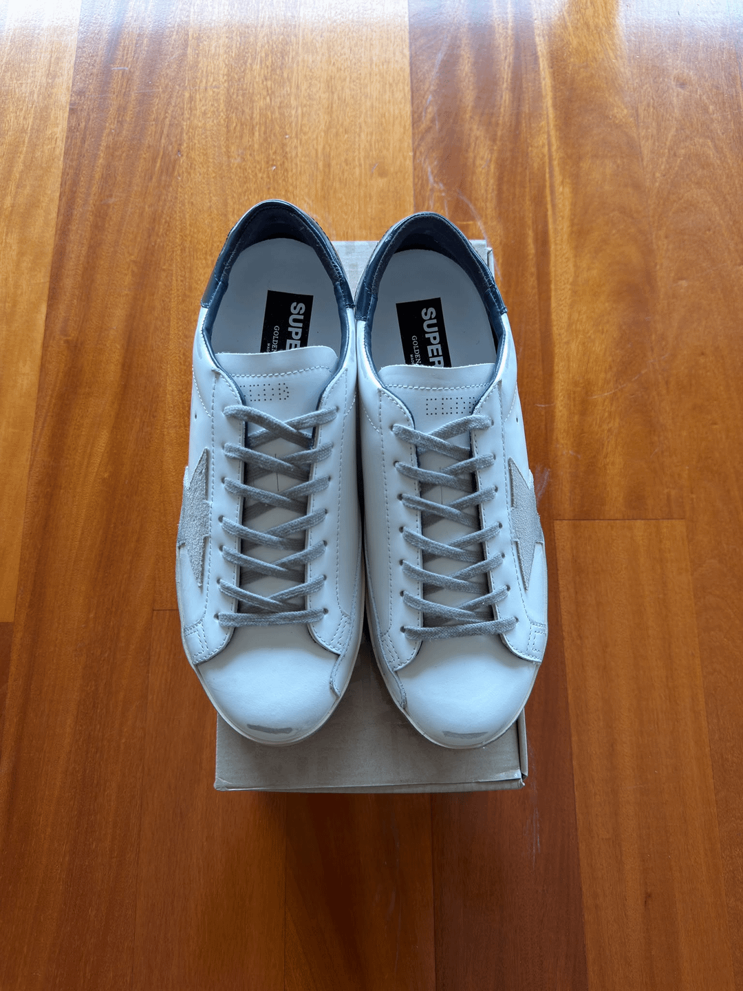 White star-detail trainers, top view