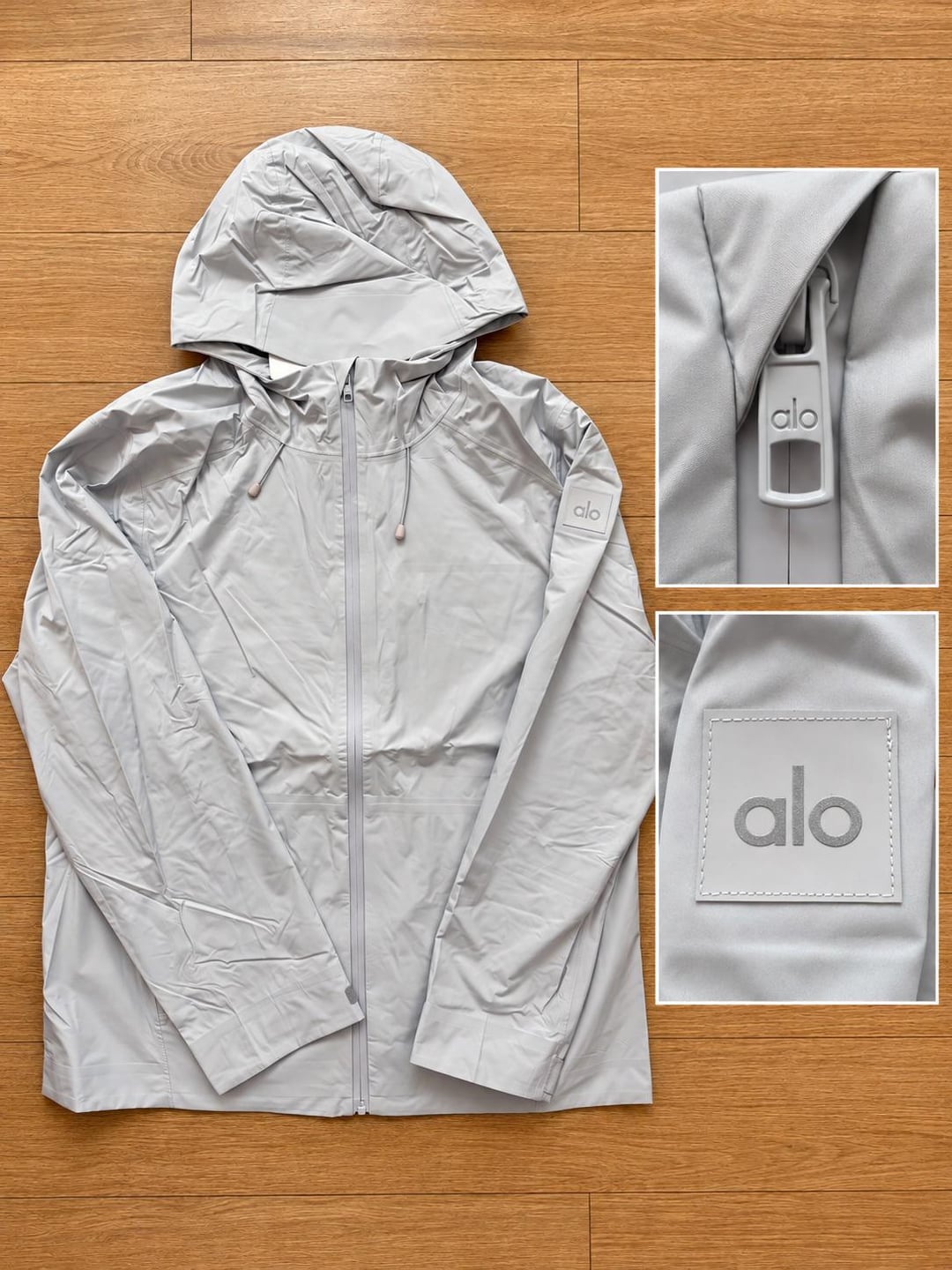 Grey Alo lightweight jacket and zip details